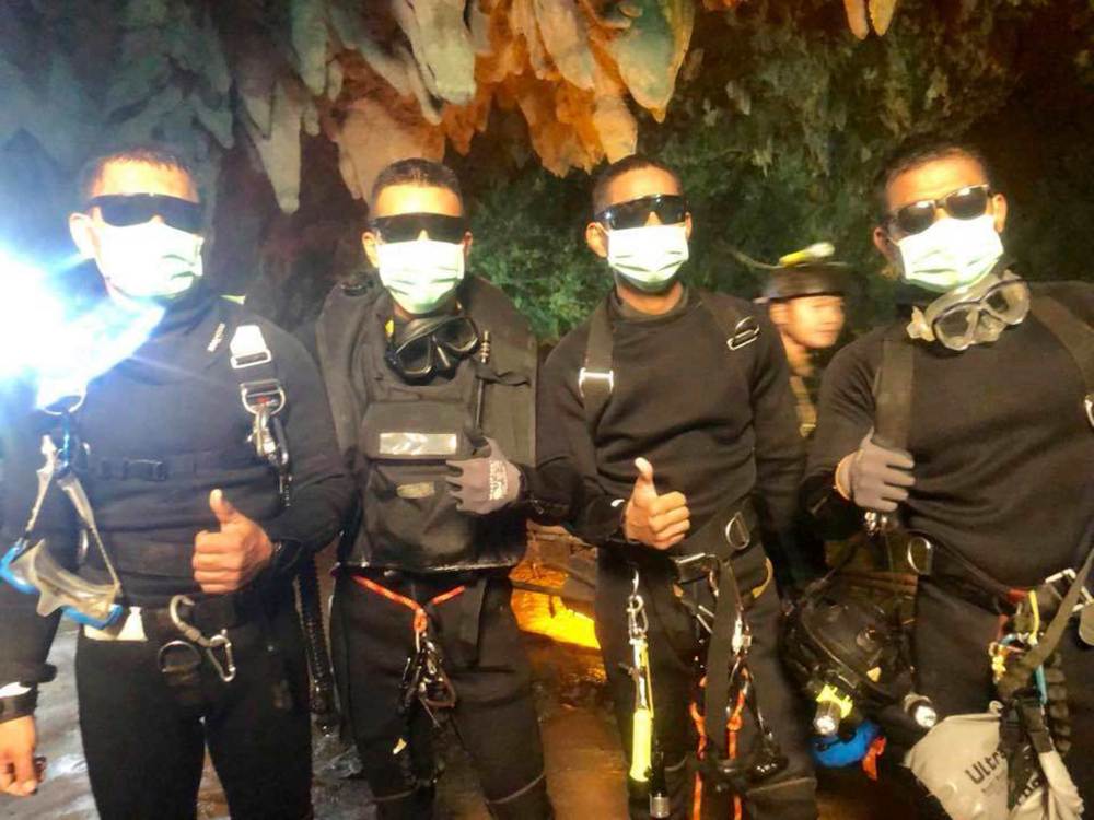 The last four Thai Navy SEALs come out safely after completing the rescue mission. (Royal Thai Navy via AP)