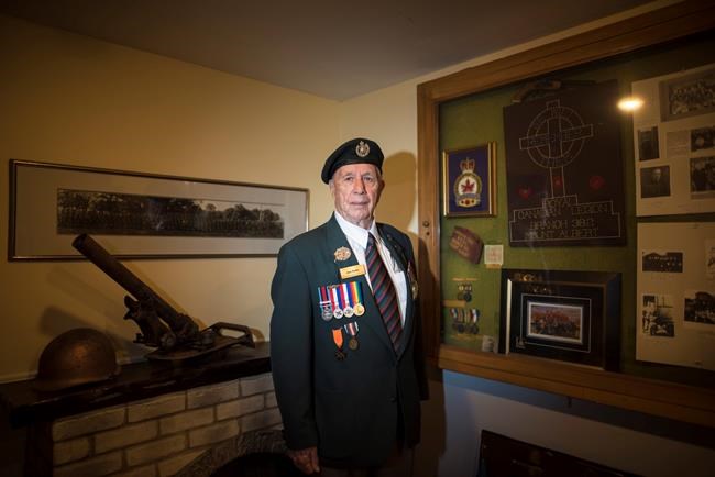 D-Day veteran Jim Parks, 94, poses for a photograph at the Mount Albert Legion in Newmarket, Ont., on Thursday, May 30, 2019. THE CANADIAN PRESS/ Tijana Martin