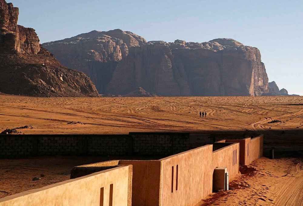 Hikers walk from the village on a trip into the desert in Wadi Rum. (Keven Frayer / Associated Press files)