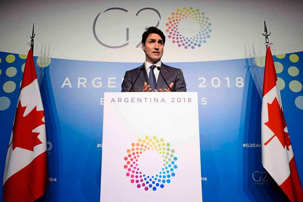 In Argentina, Prime Minister Justin Trudeau talked about the negative social consequences that accompany mostly male construction camps in rural or remote regions. (Sean Kilpatrick / The Canadian Press files)