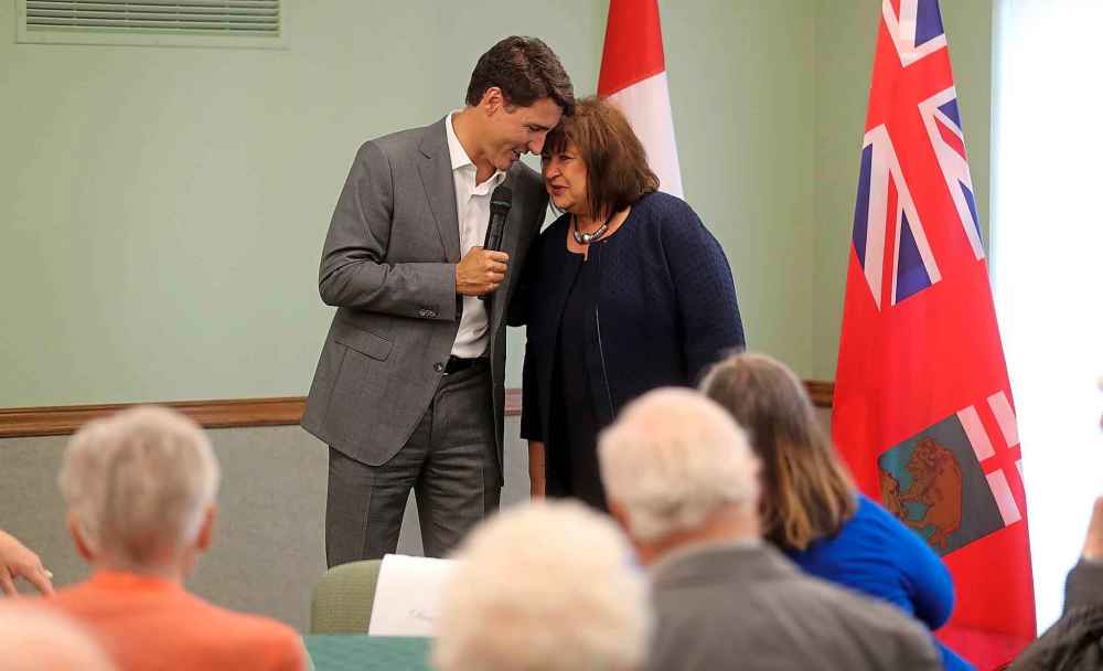 Trevor Hagan / The Canadian Press files
Prime Minister Justin Trudeau and MP MaryAnn Mihychuk, speak to residents at Carriage House North seniors residence in Winnipeg in 2018.