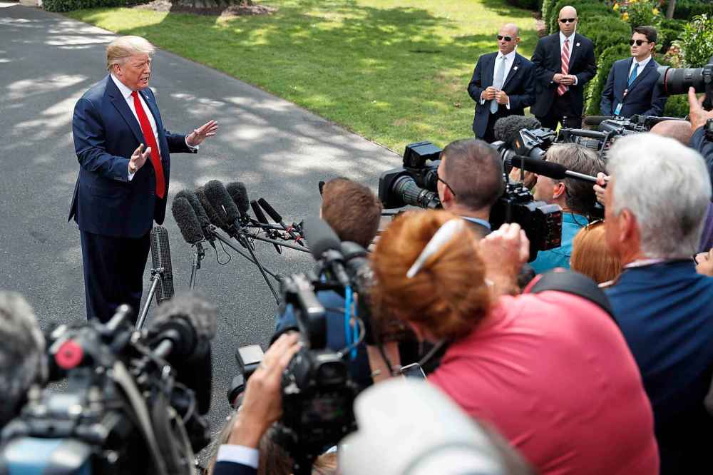 President Donald Trump speaks to the media about the testimony of White House Special Counsel Robert Mueller to Congress, Wednesday, July 24, 2019, at the White House in Washington. (AP Photo/Jacquelyn Martin)