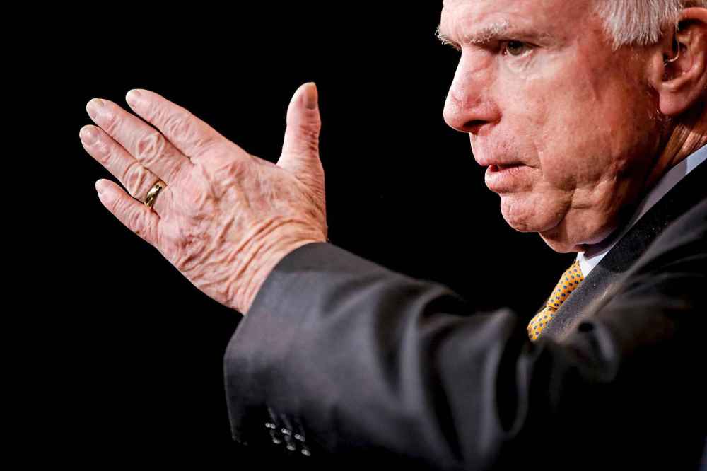John McCain speaks during a news conference on Capitol Hill in Washington in 2015.