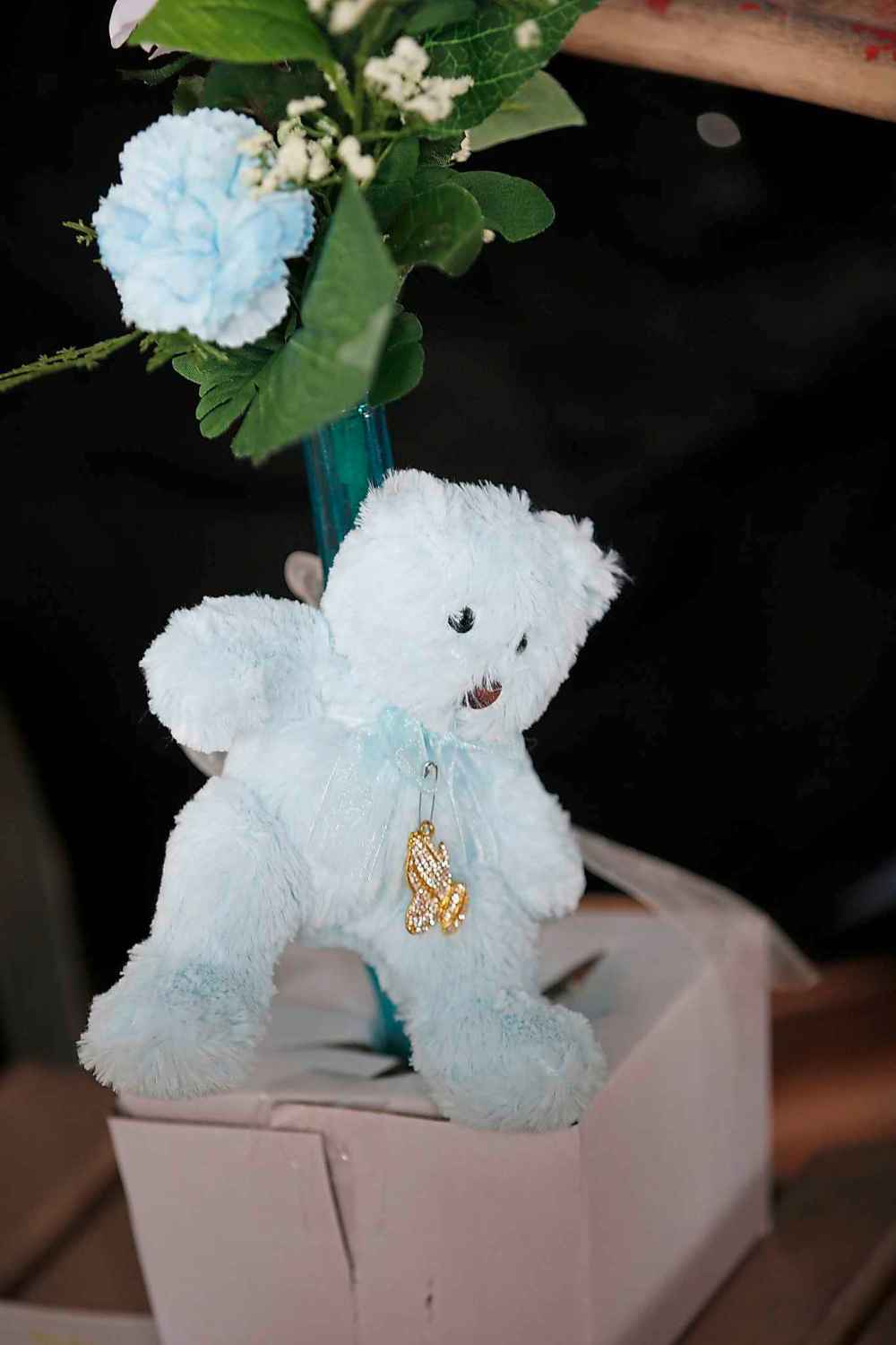 JOHN WOODS / THE CANADIAN PRESS
A toy bear is left by mourners at the vigil.