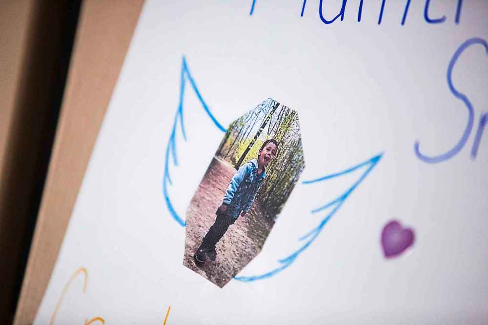 MIKAELA MACKENZIE / WINNIPEG FREE PRESS
A photo of Hunter Haze Straight-Smith at a vigil for the held for the young boy in front of the children's hospital at HSC in Winnipeg on Friday.