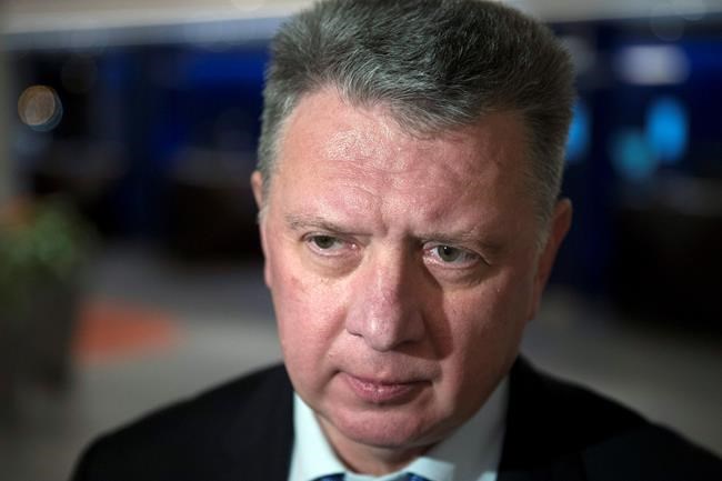 FILE - In this file photo dated Monday, Jan. 23, 2017, the president of the All-Russia Athletic Federation, Dmitry Shlyakhtin, speaks to the media in Moscow, Russia. Dmitry Shlyakhtin was suspended Thursday Nov. 21, 2019, on suspicion of obstructing an anti-doping investigation in a blow to Russia’s preparations for the 2020 Olympics. (AP Photo/Pavel Golovkin, FILE)