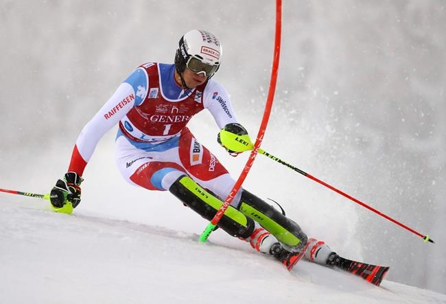 Switzerland's Ramon Zenhaeusern competes in an alpine ski, men's slalom in Levi, Finland, Sunday, Nov. 24, 2019. (AP Photo/Alessandro Trovati)