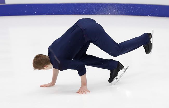 Alexander Samarin of Russia falls as he performs in the men's short program during the ISU Grand Prix of Figure Skating- Rostelecom Cup in Moscow, Russia, Friday, Nov. 15, 2019. (AP Photo/Alexander Zemlianichenko)