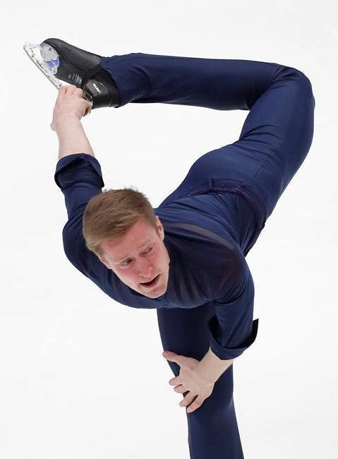 Alexander Samarin of Russia performs in the men's short program during the ISU Grand Prix of Figure Skating- Rostelecom Cup in Moscow, Russia, Friday, Nov. 15, 2019. (AP Photo/Alexander Zemlianichenko)