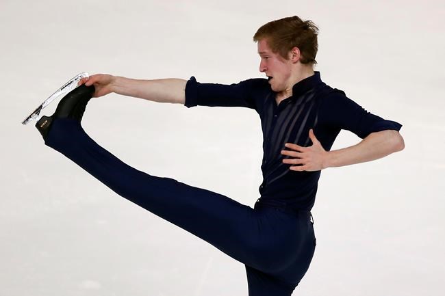 Alexander Samarin of Russia competes in the Men Short Program during the ISU figure skating France's Trophy, in Grenoble, French Alps, France, Friday, Nov. 1, 2019. (AP Photo/Francois Mori)