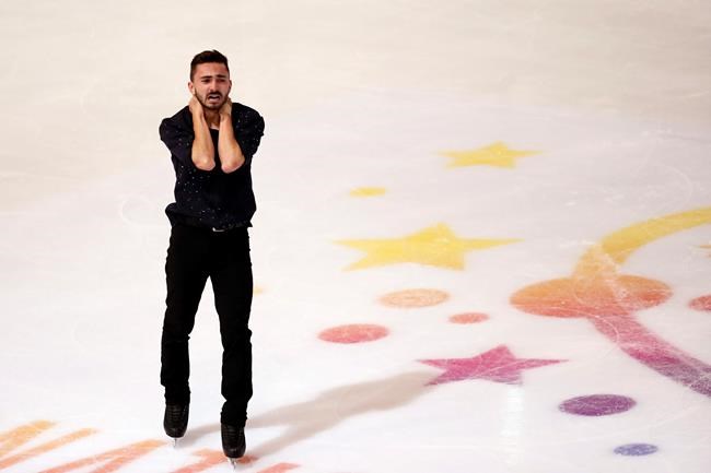 Kevin Aymoz of France competes in the Men Free Skating during the ISU figure skating France's Trophy, in Grenoble, French Alps, France, Saturday, Nov. 2, 2019. (AP Photo/Francois Mori)