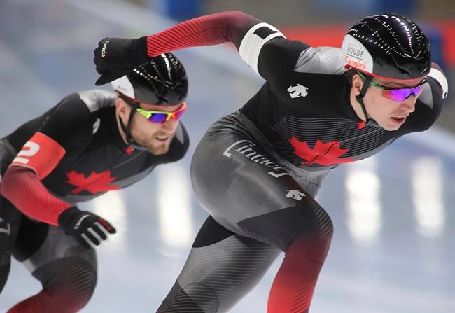 Canada's sprint team compete during the men's 500 meters race of the Speedskating World Cup, in Tomaszow Mazowiecki, Poland, Friday, Nov. 22, 2019. (AP Photo/Marian Zubrzycki)