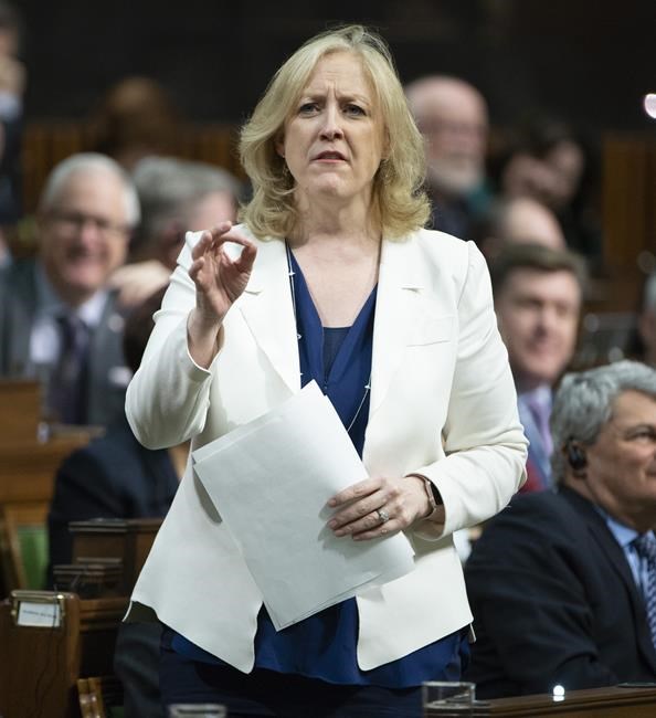 Conservative MP Lisa Raitt rises during Question Period in the House of Commons Tuesday February 26, 2019 in Ottawa. THE CANADIAN PRESS/Adrian Wyld