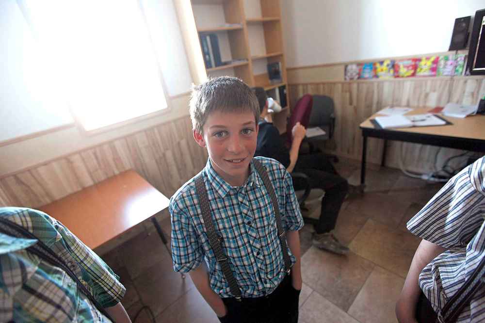 PHIL HOSSACK/Winnipeg Free Press
A young student poses in the James Valley Colony School.