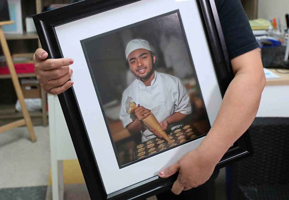 Ruth Bonneville
RUTH BONNEVILLE / WINNIPEG FREE PRESS
Local, Adao Family at Jimel's Bakery at 660 Sheppard St. location.
Emotional Photo of Imelda Adao whose son Jaime, 17 was killed on March 3 in a violent home invasion, in her office surrounded by photos of her son.
Ashley Prest | Reporter
April 26, 2019