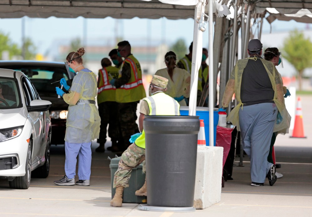 Forum Communications Co.
Fargo Cass Public Health and the North Dakota National Guard conduct COVID-19 drive-up testing for North Dakota State University staff and students, along with area K-12 teachers, in August at the Fargodome.(David Samson / Forum News Service files)