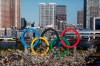 The Olympic rings float in the water on a barge Wednesday, March 25, 2020, in the Odaiba section of Tokyo. Not even the Summer Olympics could withstand the force of the coronavirus. After weeks of hedging, the IOC took the unprecedented step of postponing the world's biggest sporting event, a global extravaganza that's been cemented into the calendar for more than a century. (AP Photo/Jae C. Hong)