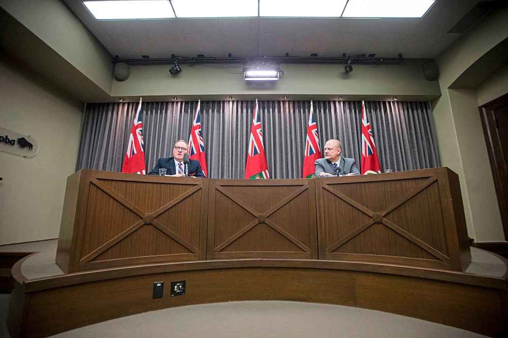 Finance minister Scott Fielding (left) and government house leader Kelvin Goertzen asked the NDP to allow the legislature to function normally. (Mikaela MacKenzie / Winnipeg Free Press)