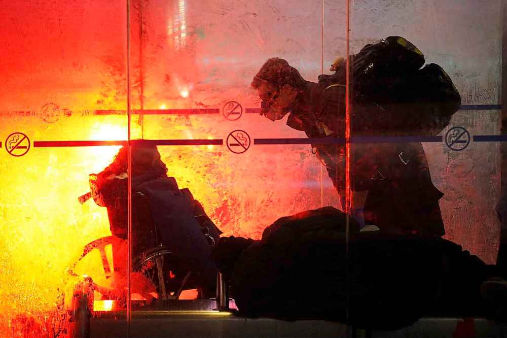 JOHN WOODS / WINNIPEG FREE PRESS
At a bus shack in Osborne Village paramedics attend to people after being called by Merv Halvorsen, a pastor with Salvation Army (SA), as they were driving around in their Extreme Environment Response Vehicle in downtown Winnipeg Saturday, April 4, 2020.
Reporter: Thorpe