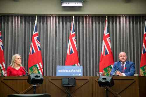 MIKAELA MACKENZIE / WINNIPEG FREE PRESS

Dr. Brent Roussin, chief provincial public health officer, and Lanette Siragusa, chief nursing officer, speak at a press conference at the Manitoba Legislative Building in Winnipeg on Monday, Nov. 2, 2020. For Danielle Da Silva story.

Winnipeg Free Press 2020