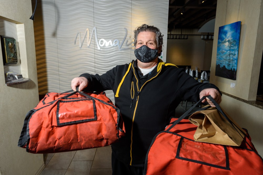Mona Lisa started as a pickup-and-delivery restaurant, but Joe Grande didn't have to wear a mask back then. (Jesse Boily / Winnipeg Free Press)