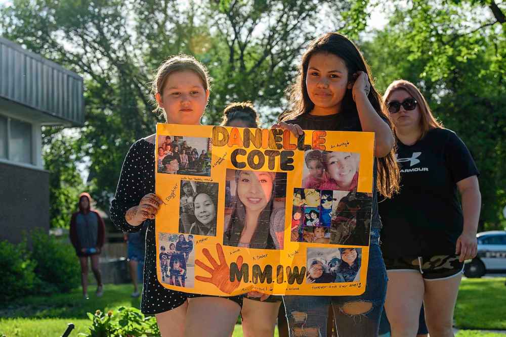 JESSE BOILY / WINNIPEG FREE PRE
Friends and family of Danielle Cote gathered in the 400 block of Flora Avenue Friday, July 3, two days after the 27-year-old was shot and killed while walking along that block at 3:15 a.m. with her cousin, who was injured in the shooting. (Jesse Boily/Winnipeg Free Press)