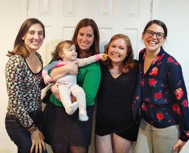 Genna Buck (far right) poses with friends (left to right) Odette Hutchings, Beth McNeil, and Hilary Holden Straus at Buck's fifth annual Friendsgiving celebration in Toronto — the last in-person Friendsgiving before the COVID-19 pandemic, in a handout photo. THE CANADIAN PRESS/HO-Genna Buck MANDATORY CREDIT