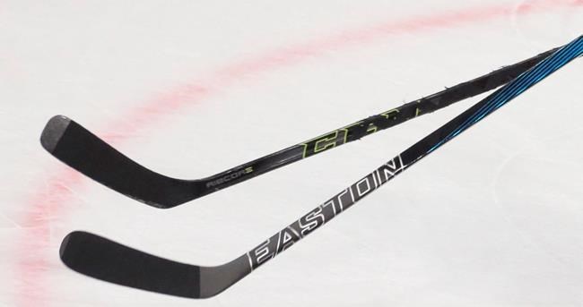Players' sticks are shown during a World Hockey Championships game in Moscow, Russia on Thursday, May 12, 2016. A senior hockey team in a small city in southern Manitoba has changed its name following a push against the use of Indigenous names and caricatures as mascots. THE CANADIAN PRESS/AP, Ivan Sekretarev