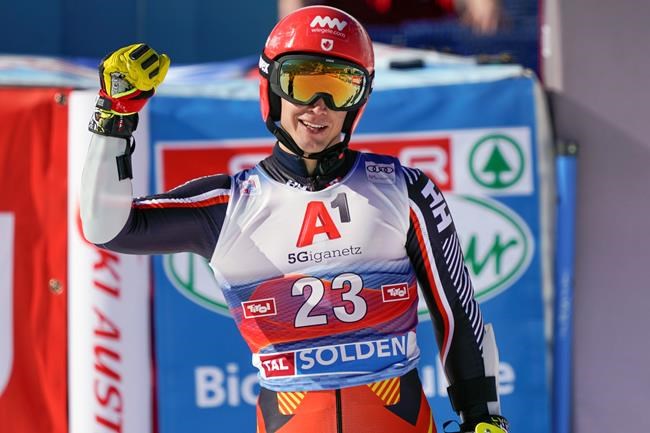 Canada's Erik Read waves in the finish area after completing alpine ski, men's World Cup giant slalom in Soelden, Austria, Sunday, Oct. 18, 2020. THE CANADIAN PRESS/AP/Giovanni Auletta