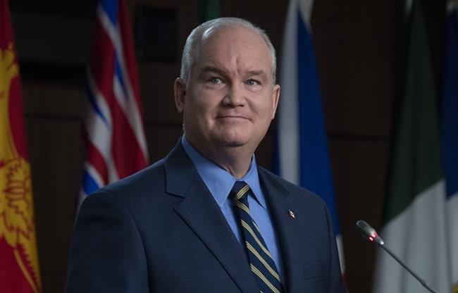 Conservative Party Leader Erin O'Toole listens to a question from a reporter during a news conference, in Ottawa, Monday, Dec. 7, 2020. THE CANADIAN PRESS/Adrian Wyld