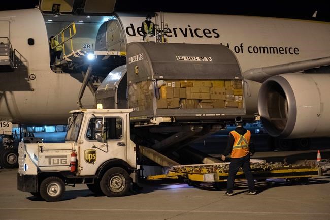 Shipments of initial doses of COVID-19 vaccines arrive in Montreal, Sunday, Dec.13, 2020. Ontario will administer the province's first COVID-19 vaccination today, with a health-care worker set to receive the dose in Toronto. THE CANADIAN PRESS/HO-Canadian Armed Forces-Cpl Matthew Tower*MANDATORY CREDIT*