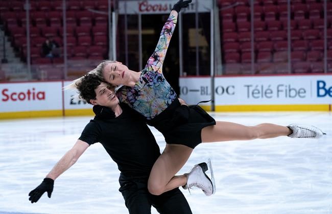 Ice dancers Piper Gilles and Paul Poirier perform their routine during a practice in Montreal, on Monday, February 24, 2020. THE CANADIAN PRESS/Paul Chiasson