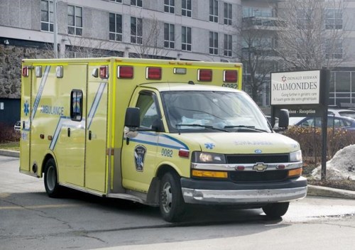 An ambulance leaves the Maimonides Geriatric Center in Montreal, Sunday, Nov. 29, 2020. Seven residents of the Montreal long-term care centre who received a first dose of the Pfizer-BioNTech vaccine have contracted COVID-19. THE CANADIAN PRESS/Graham Hughes