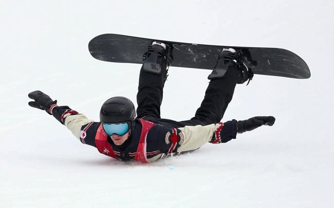Max Parrot, of Canada, crashes during the men's Big Air snowboard competition at the 2018 Winter Olympics in Pyeongchang, South Korea, Saturday, Feb. 24, 2018. Canada's slopestyle snowboard team is in isolation and will not participate in this week's World Cup season opener after two members of its delegation tested positive for COVID-19. THE CANADIAN PRESS/AP/Matthias Schrader