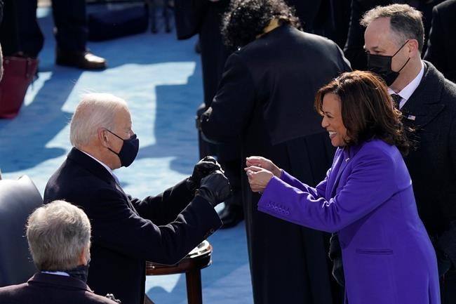President-elect Joe Biden congratulates Vice President Kamala Harris after she was sworn in during the 59th Presidential Inauguration at the U.S. Capitol in Washington, Wednesday, Jan. 20, 2021. THE CANADIAN PRESS/AP-Carolyn Kaster