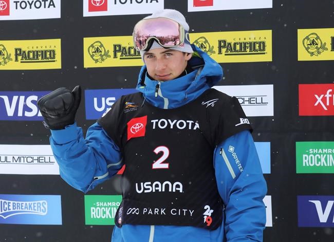 Canadian Mark McMorris celebrates his silver medal on the podium following the men's slopestyle snowboard world championship Sunday, Feb. 10, 2019, in Park City, Utah. THE CANADIAN PRESS/AP-Rick Bowmer