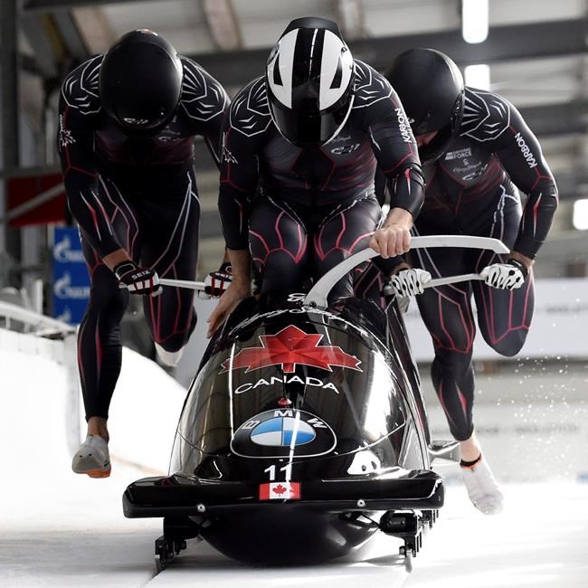 Team Justin Kripps, Ryan Sommer, Cameron Stones and Benjamin Coakwell of Canada start during the four-man bobsled first race at the Bobsleigh and Skeleton World Championships in Altenberg, eastern Germany on February 29, 2020. THE CANADIAN PRESS/AP, Jens Meyer