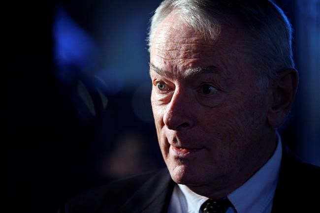 Inductee to Canada's Sports Hall of Fame, Dick Pound, a former vice-president of the International Olympic Committee, speaks to the media at the hall in Calgary, Alta., Tuesday, Nov. 8, 2011. Pound believes Olympians should still be high priority for the COVID-19 vaccine, despite news that they won't be required for participation in the Tokyo Games this summer. THE CANADIAN PRESS/Jeff McIntosh