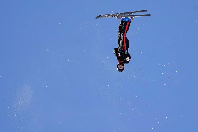 Canada's Emile Nadeau competes in the World Cup men's freestyle aerials skiing event, Saturday, Feb. 6, 2021, in Deer Valley, Utah. (AP Photo/Rick Bowmer)