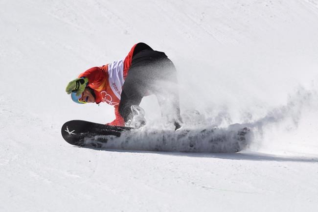Canada's Eliot Grondin competes in a men's snowboard cross heat at the Phoenix Snow Park at the 2018 Winter Olympic Games in Pyeongchang, South Korea, Thursday, Feb. 15, 2018. THE CANADIAN PRESS/Jonathan Hayward