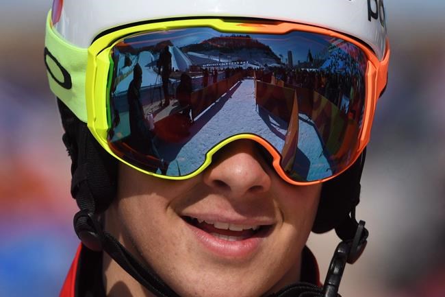 Canada's Eliot Grondin looks on after competing in a men's snowboard cross heat at the Phoenix Snow Park at the 2018 Winter Olympic Games in Pyeongchang, South Korea, Thursday, Feb. 15, 2018. Grondin continued his strong season with his first career World Cup snowboard cross victory on Thursday. THE CANADIAN PRESS/Jonathan Hayward