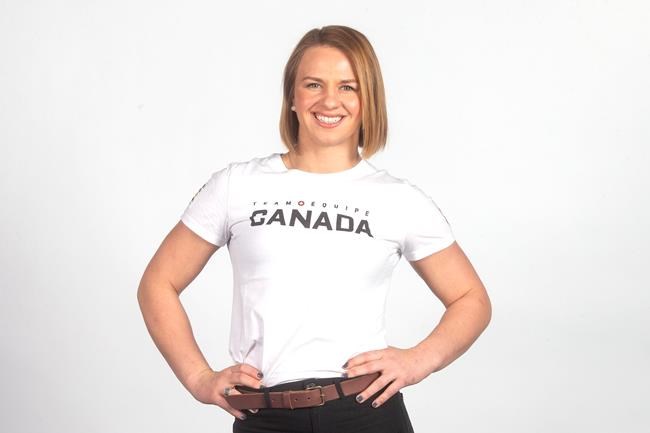 Canadian Olympic Athlete Erica Wiebe poses for a photo during a media availability in Toronto on Thursday, Dec. 12, 2019. Weibe, an Olympic gold medallist, is hopeful an IOC deal with China on vaccines can help the global fight against COVID-19 ahead of the Tokyo Games this summer. THE CANADIAN PRESS/Chris Young