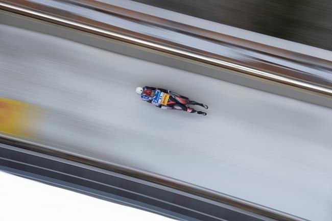 Tristan Walker and Justin Snith of Canada speed down the track during the men's doubles race at the Luge World Championships in Koenigssee,Germany, Saturday Jan. 30, 2021. THE CANADIAN PRESS/AP-Andreas Schaad