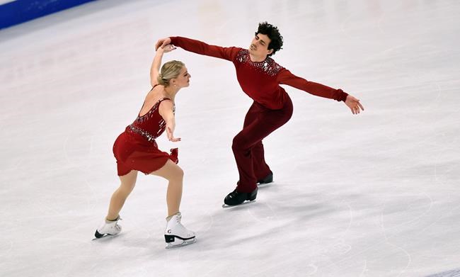 Piper Gilles and Paul Poirier of Canada perform during the Ice Dance-Free Dance at the Figure Skating World Championships in Stockholm, Sweden, Saturday, March 27, 2021. (AP Photo/Martin Meissner)