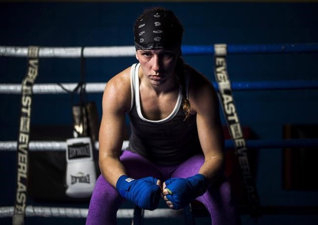 Canadian boxer Mandy Bujold poses for a photograph at her boxing club in Toronto on Wednesday, June 29, 2016. THE CANADIAN PRESS/Nathan Denette
