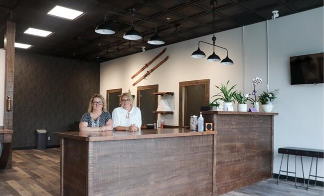 Mountain Men's Barbershop co-owners Laura-Lee Gambee, left, and Heidi Forster pose in their Collingwood, Ont., shop in an undated handout image. Small business owners and the Canadian Federation of Independent Businesses say companies started in the months leading up to COVID-19 or those that opened during the pandemic don't qualify for the recently-extended rent or wage subdies or a new hiring subsidy the government announced Monday. THE CANADIAN PRESS/HO-Kiley VanderMeer, *MANDATORY CREDIT*