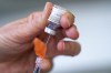 A syringe is loaded with COVID-19 vaccine at a vaccination clinic run by Vancouver Coastal Health, in Richmond, B.C., Saturday, April 10, 2021. Ontario is expected to lower the age of COVID-19 vaccine eligibility to 40 across the province this week as it continues to expand its rollout. THE CANADIAN PRESS/Jonathan Hayward
