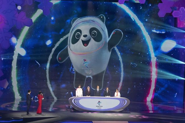 FILE - In this Sept. 17, 2019, file photo, Bing Dwen Dwen, the official mascot for the 2022 Beijing Winter Olympic is revealed at a ceremony at the Shougang Ice Hockey Arena in Beijing. Groups alleging human-rights abuses in China are calling for a full boycott of the Beijing Olympics, which is sure to ratchet up pressure on the International Olympic Committee, athletes, sponsors, and sports federations. A coalition of activists representing Uyghurs, Tibetans, residents of Hong Kong and others, issued a statement Monday, May 17, 2021 calling for the “full boycott,” eschewing lesser measures like “diplomatic boycotts
