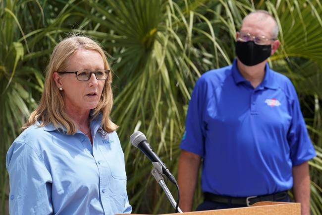 Deanne Criswell, FEMA administrator, and Ken Graham, director of NOAA's National Hurricane Center, talk about preparations for the upcoming hurricane season, Thursday, May 13, 2021, in Miami. (AP Photo/Marta Lavandier)