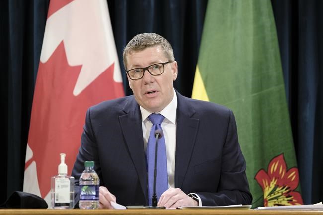 Saskatchewan Premier Scott Moe speaks at a press conference at the Legislative Building in Regina, Thursday, March 25, 2021. The government of Saskatchewan is preparing to start easing restrictions Sunday as part of its reopening roadmap. THE CANADIAN PRESS/Michael Bell